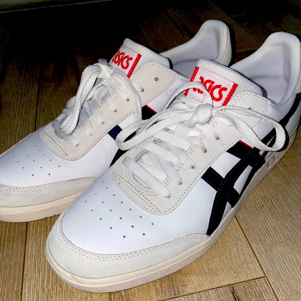 ASICS sneakers.